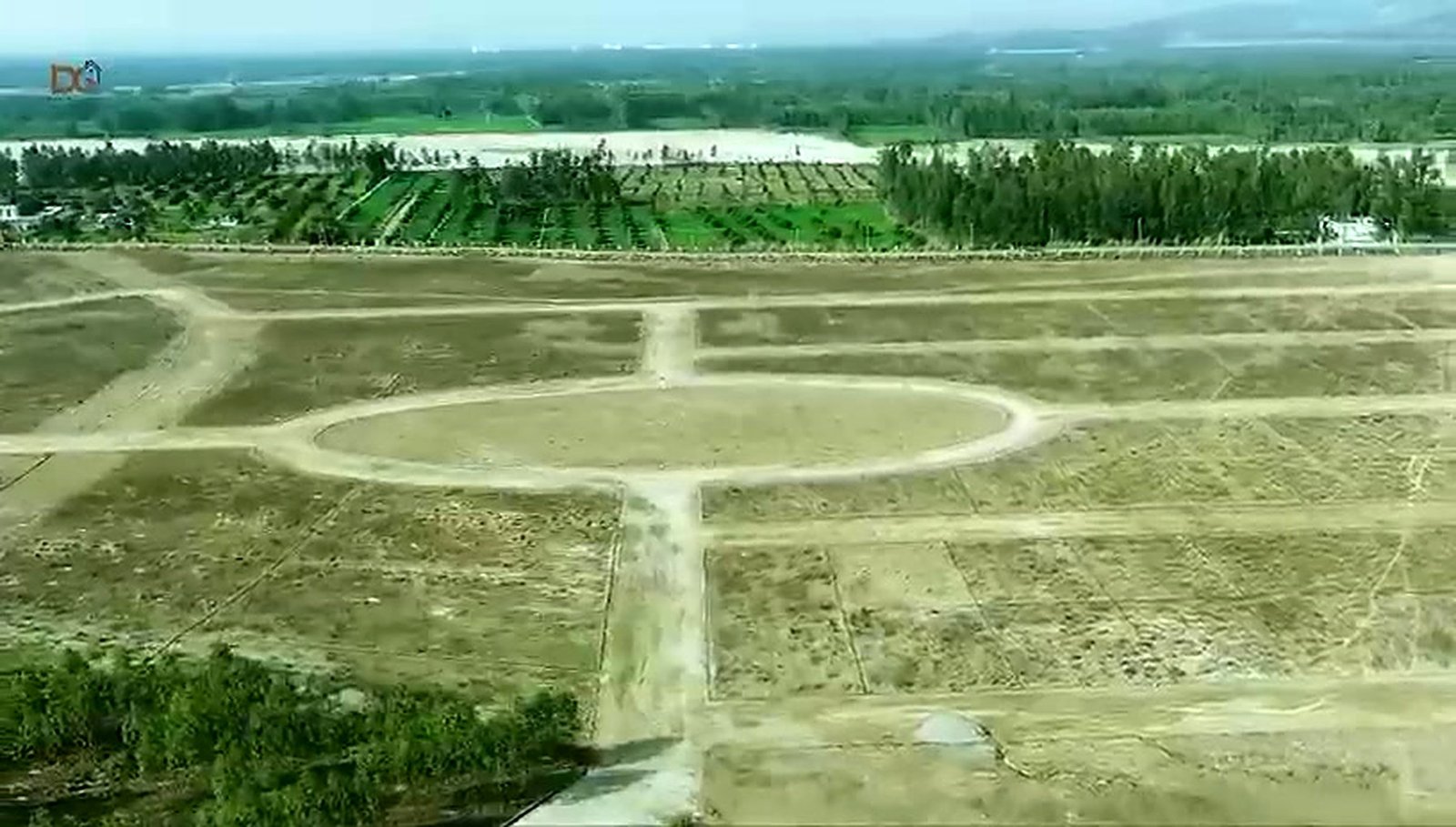 Aerial drone view of plotted land with marked internal roads